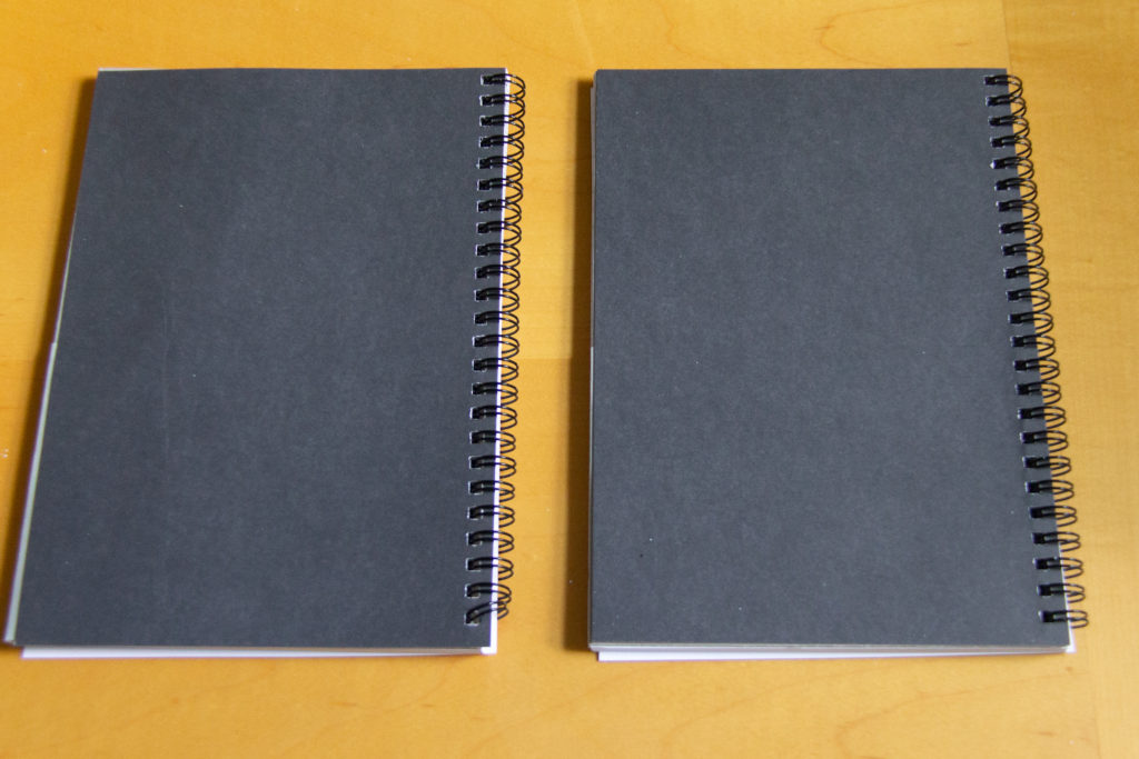 The back of the Monster Bear and Orange Slices Fruit Notebooks from Red Bubble